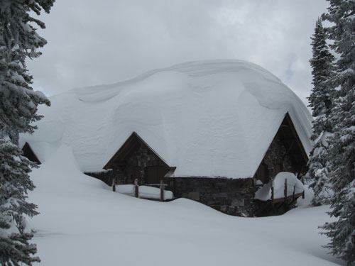 Sperry Chalet buried under snow.